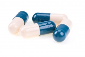Capsules with an antibiotic